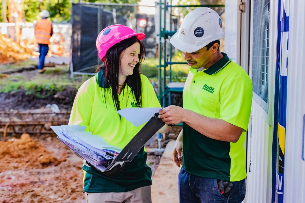 Hulk crew working through requirements on a live construction site